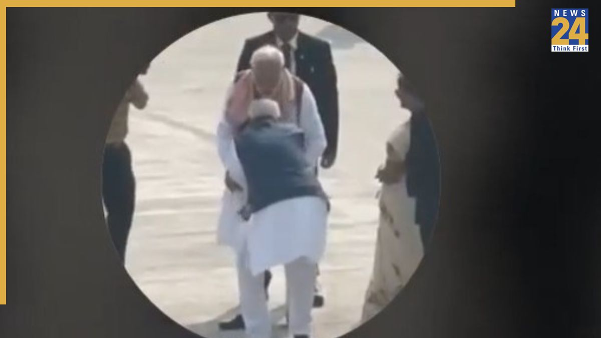 SHOCKING: RJD shares Viral Video of Nitish Kumar allegedly touching PM Modi’s feet at Patna Airport