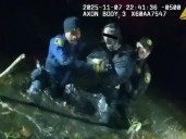 Man removed from Michigan river after jumping from window, alleged break