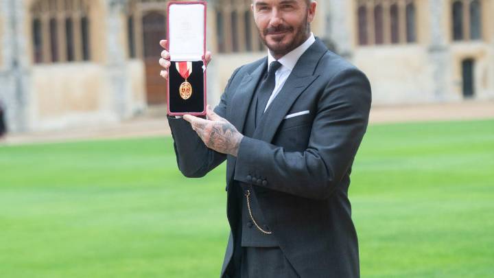 Sir David Beckham paid tribute to wife Victoria Beckham with his knighthood ceremony outfit