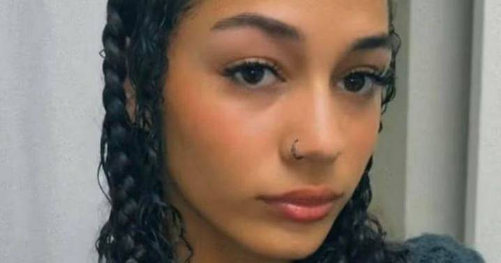 'Beautiful' woman, 23, mauled to death by three pit bulls as dogs 'severed artery'