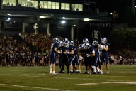 Lake Oswego rolls past Sprague to open football state tournament play