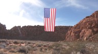 Huge American flag hoisted over Snow Canyon for Veteran's Day