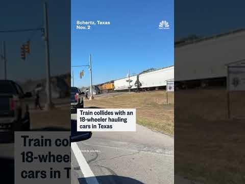 Train collides with truck hauling cars in Texas