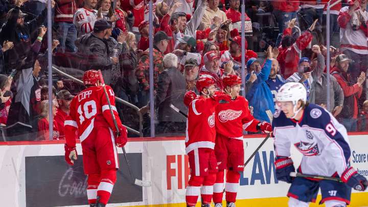 DeBrincat scores in OT, Red Wings rally to defeat Blue Jackets