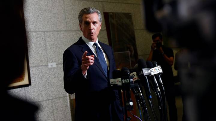 Trump admin sues to block California’s ICE mask ban