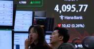 Asian shares are mostly higher in cautious trading as Wall Street settles