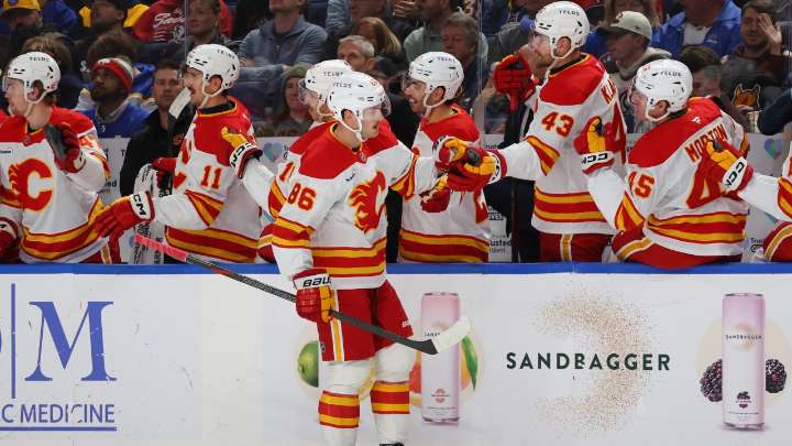 Flames crush Sabres in battle of last
