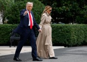‘OMG': Folks In Stiches After Trump Keeps the Umbrella for Himself and Leaves Melania in the Rain