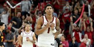 Thomas scores 26 point as No. 21 Arkansas rallies past Winthrop