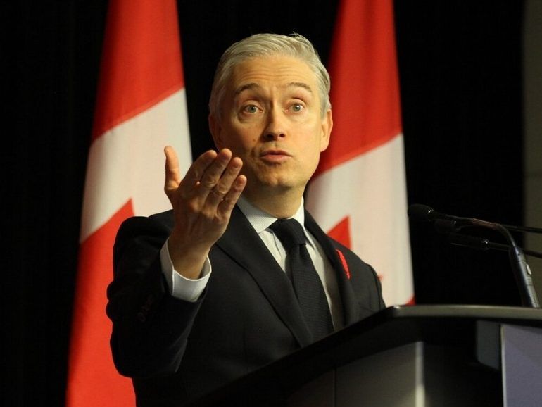 Budget more than doubles deficit, includes big spend on infrastructure