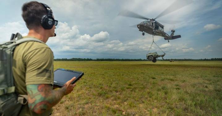 Guardsman flies remote-control Black Hawk chopper using tablet