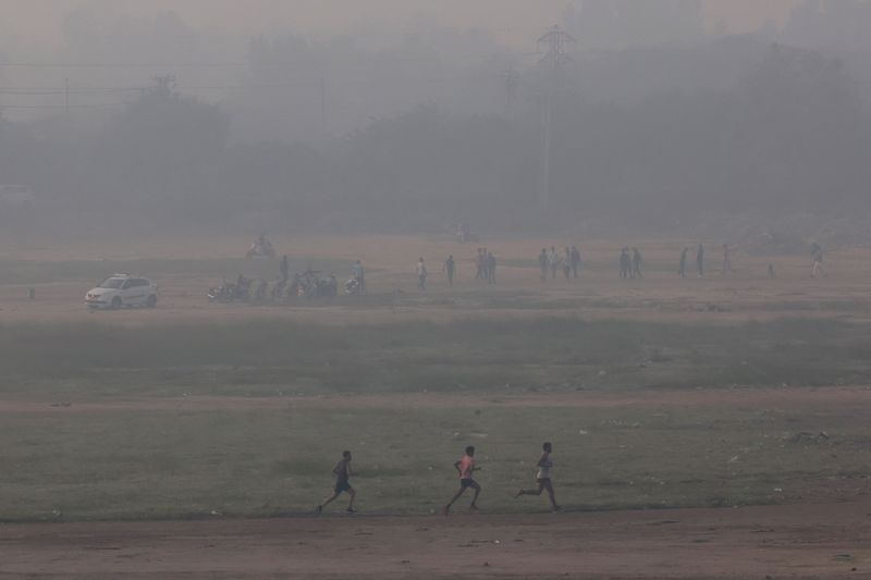 India tightens anti-pollution curbs in capital Delhi as air quality dips