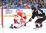 Deadspin | After giving up lead, Flames torch Sabres with 4-goal 3rd