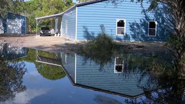 Cocoa homeowner cited for draining property after historic rainfall
