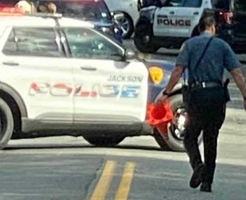 Car veers off East Vets highway in Jackson, crashing into woods