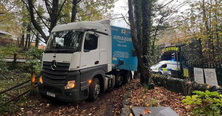 Amazon lorry gets stuck after avoiding low bridge in Wigan
