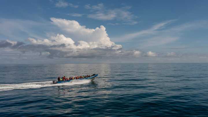 This boat carries them south, away from their American dream