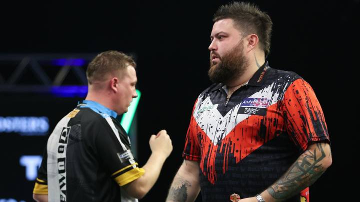 Grand Slam of Darts 2025: Michael Smith sets up showdown with Luke Humphries after surviving 11 match darts from Chris Dobey