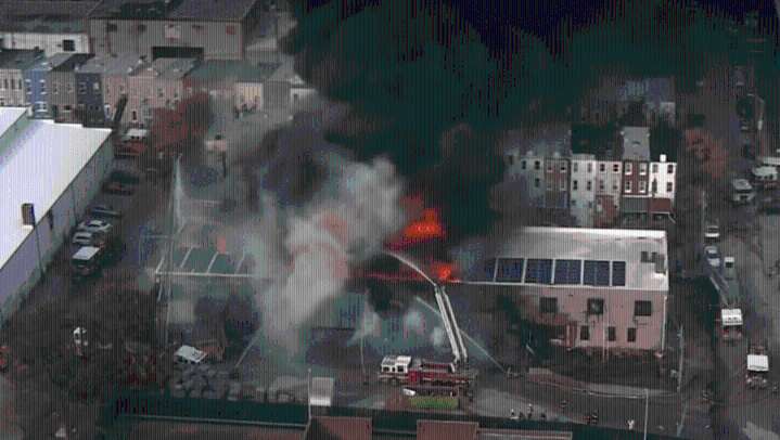 Firefighters battle massive North Baltimore blaze as roof threatens to collapse; crews expected to work overnight