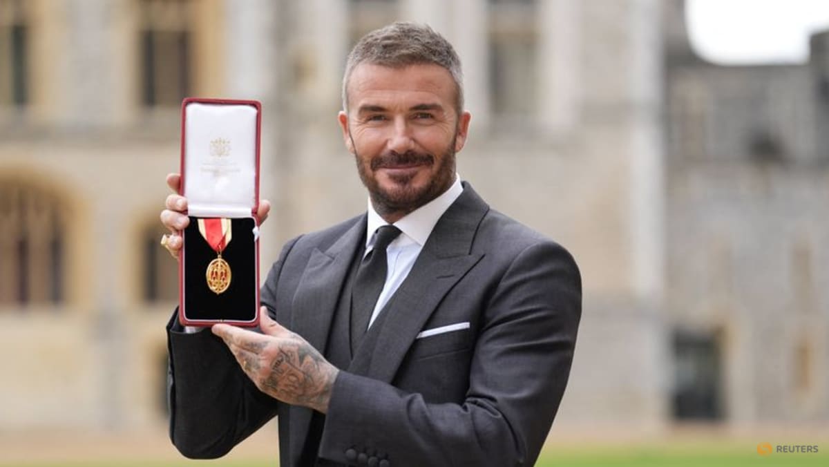 David Beckham knighted for services to sport and charity
