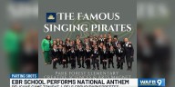 The Famous Singing Pirates performing national anthem at Pelicans game