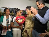 Assam minister Nandita Gorlosa felicitates cricketer Uma Chetry