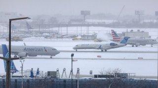 Hundreds of flights canceled as winter storm hits Midwest, Chicago’s O’Hare