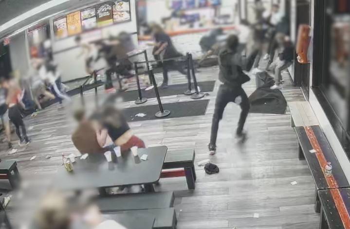 Man arrested after allegedly shooting 4 people at Kalamazoo restaurant, fleeing the state