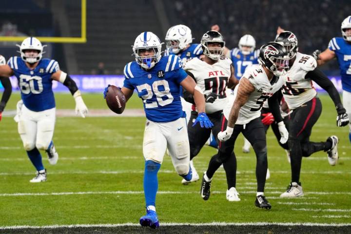 Taylor runs for 244 yards and 3 TDs for Colts in 31-25 OT win over Falcons in Berlin