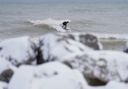 Arctic air hits much of the U.S., bringing snow to some areas and very chilly temperatures to Florida