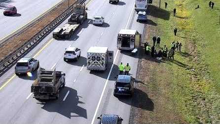 Man falls off bus on I-95 in Maine after climbing through roof hatch