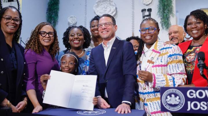 CROWN Act banning hair discrimination signed into law