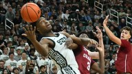 No. 22 Michigan State pulls away to beat Colgate in season opener