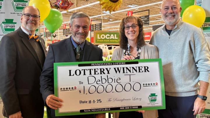 Berks County woman wins lottery, presented with $1 million check