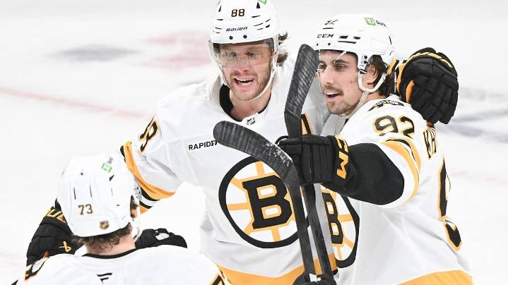 Bruins' Charlie McAvoy hit in the mouth by a slap shot, exits game against Canadiens