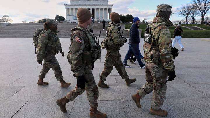 U.S. halts all asylum decisions after shooting of National Guard members