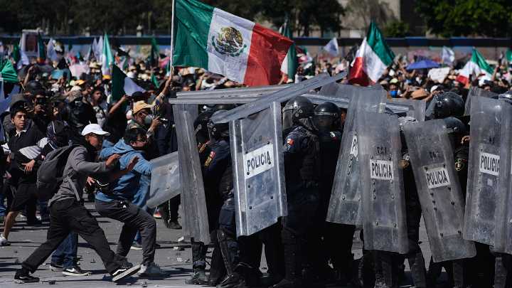 Mexico City protesters attack police in violent anti