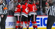 Dach scores late in 3rd period to lead Blackhawks to 3