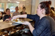 Salvation Army, volunteers serve community meals