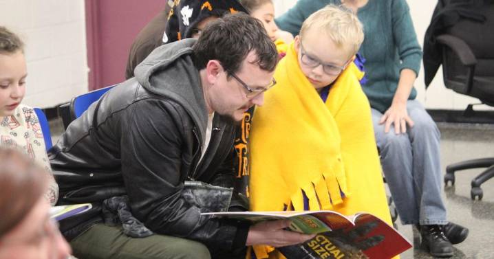 "Cuddle and Read" event encourages parents and kids to read together