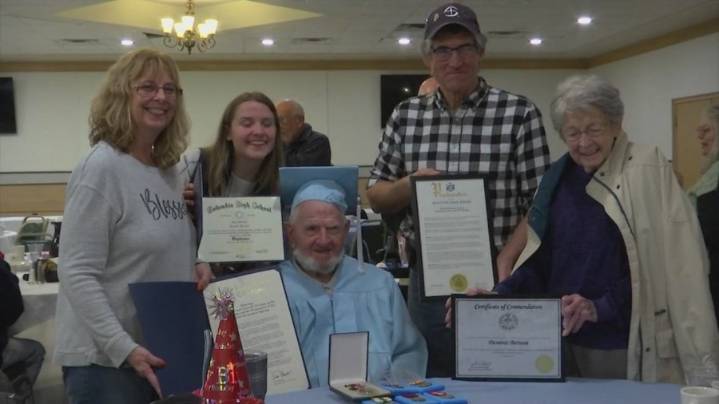 WWII veteran receives high school diploma on 99th birthday