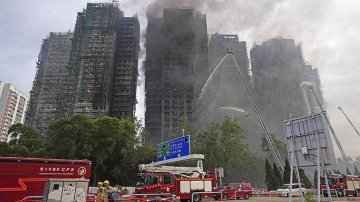 Police make arrests over huge Hong Kong flats fire - with dozens killed and more still missing