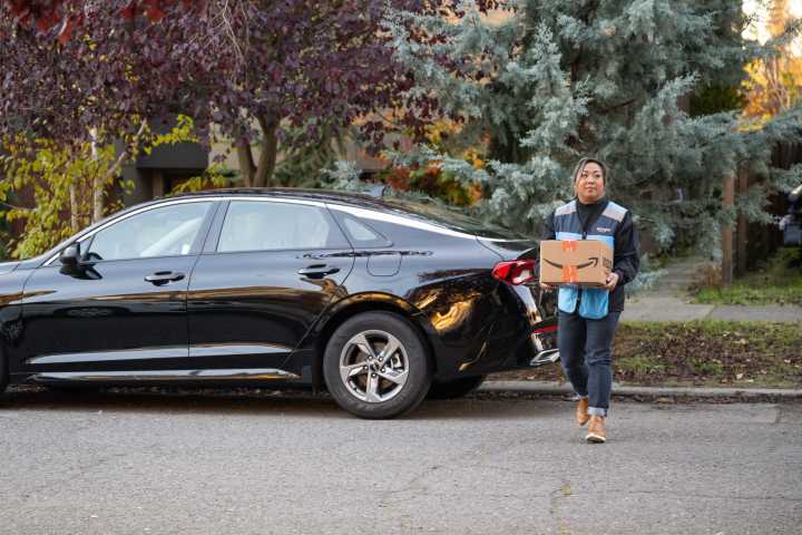 Americans report reduced holiday spending, need for extra income