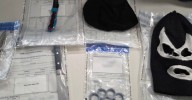 Men charged with stashing drugs, weapons, balaclava in car