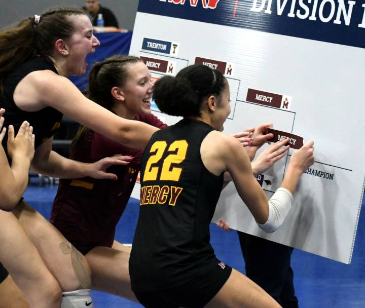 Photo gallery from FH Mercy vs. Bloomfield Hills in the D1 volleyball title match