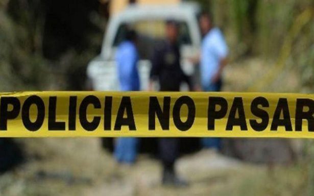 En Mixquiahuala, localizan el cuerpo de un hombre dentro de una camioneta de lujo