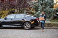 Americans report reduced holiday spending, need for extra income