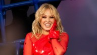 Kylie Minogue turns up the festive fun in fire