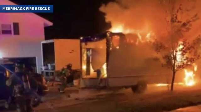 Investigation underway after box truck catches fire in Merrimack driveway