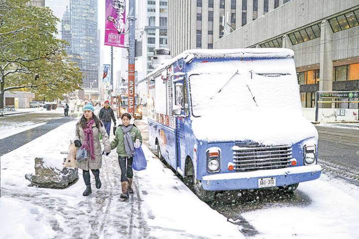 Arctic blast is sweeping east, bringing first snow of the season